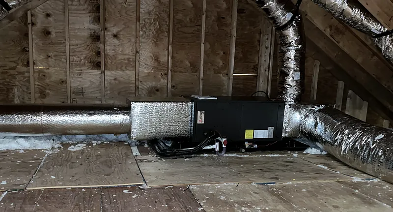 Mitsubishi Electric ducted indoor unit in an attic, with insulated flex duct runs